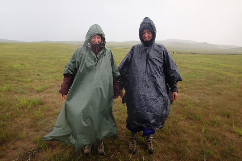 Hikers-stuck-in-their-ponchos-in-the-rain