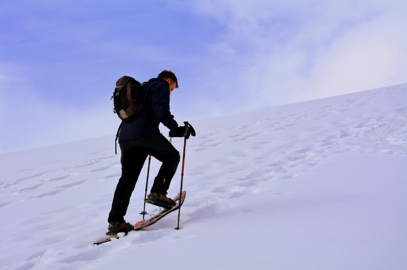 man-with-snowshoes